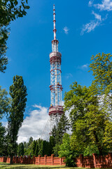 Obraz premium Kyiv (Kiev), Ukraine - July 31, 2020: A big and high metal tower, pipe for radio and television broadcasting 