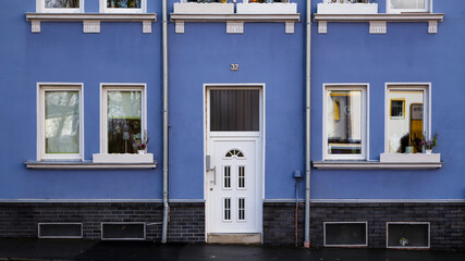 Blue home, white door