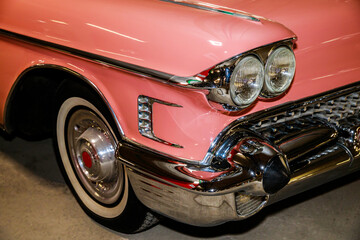 beautiful retro car of pink color.