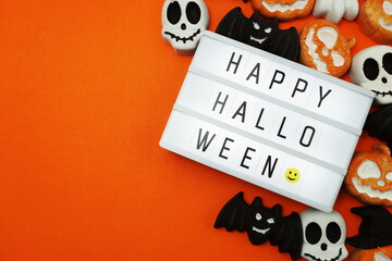 Top view Happy Halloween word in Light box flat lay