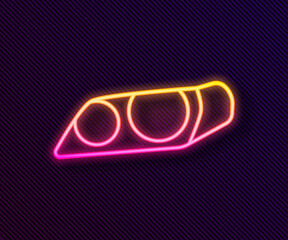 Glowing neon line Car headlight icon isolated on black background. Vector Illustration.