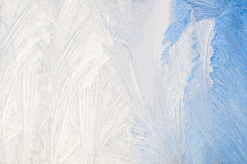 Winter background, frost on window. Frosted glass with patterns