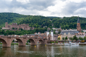 view of the historic old town of Heidelberg with the pedestrian bridge and palace