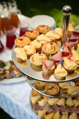 catering in a country restaurant on a glade. Tables served with tablecloths
