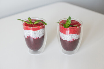 Delicious yogurts on a white table. Soft selective focus. Healthy desserts. Healthy concept of life