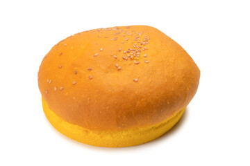 Yellow burger bread isolated on white.