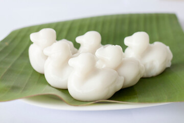 Nata de coco or young coconut milk jelly duck shape (Wun Kati) on banana leaf is a Thai dessert.