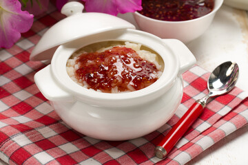 Rice pudding with homemade raspberry jam
