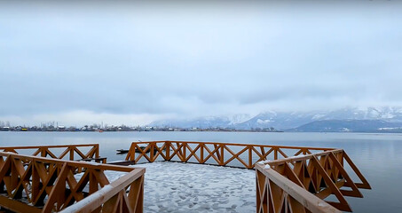 wooden bridge over the lake, wooden Railing Mountain View point.