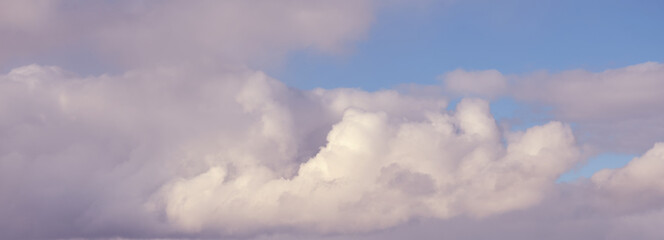 Clouds in blue sky as a natural background.