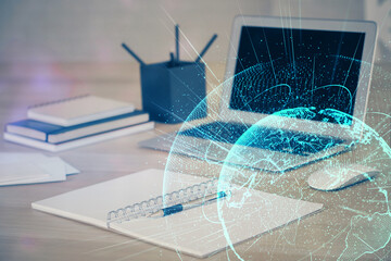 Computer on desktop with social network theme icon. Multi exposure. Concept of international connections.