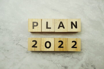 Plan 2022 alphabet letter on marble background