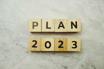 Plan 2023 alphabet letter on marble background