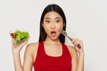 Diet food slim figure beautiful woman with a fork in her hand 