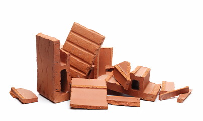 Shattered perforated brick pieces isolated on white background