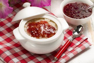 Rice pudding with homemade raspberry jam