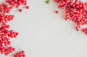 Bright red currant frame. Fresh ripe berries with copy space