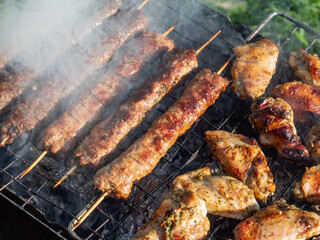 Grilling tasty kebab on a barbecue grill