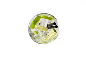 Caipiroska cocktail with lime isolated on white background.Top view	
