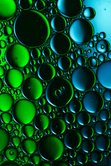 abstract water drops colorful background, green and blue
