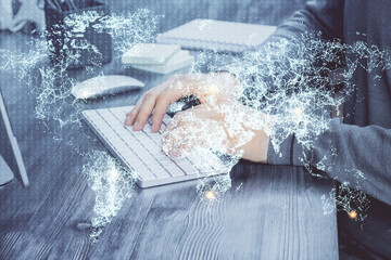 Social network theme hologram with businessman working on computer on background. Concept of world...