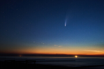 Comet Neowise. Stars and Sun Dawn at Baltic Sea 