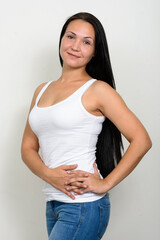 Portrait of beautiful woman against white background