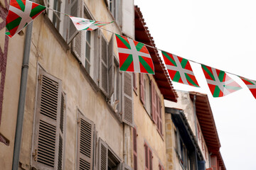 flag basque in street with old house beautiful Traditional bask housing
