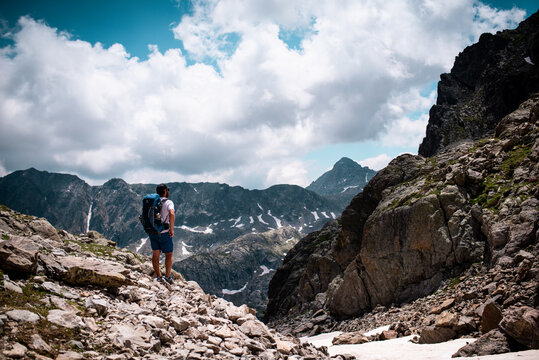 Hinking in the alps mountain with backpack and landscape