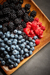 raspberry and blackberry on plate