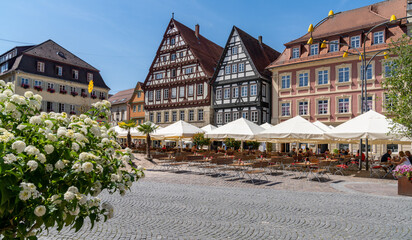 Naklejka premium beautiful half-timbered houses and street cafes in Schwaebisch Gmuend