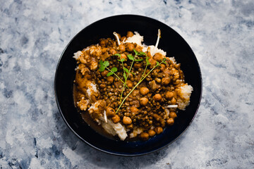 plant-based food, vegan rice and beans with mexican spices and cilantro topping