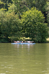 female paddleboard yoga class on the Neckar River in Stuttgart