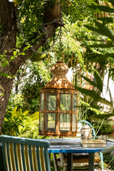 Cozy garden with dramatic fantasy lamp decoration made of wood