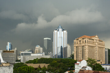 group of modern skyscrapers before the storm in Kuala Lumpur
