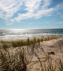 Fototapeta na wymiar Sand dunes and sea
