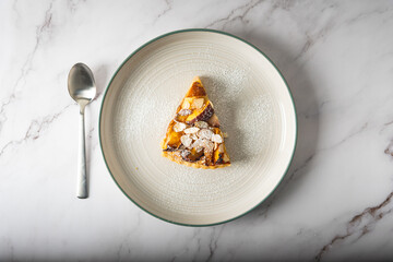 Homemade Peach tart with almond topping