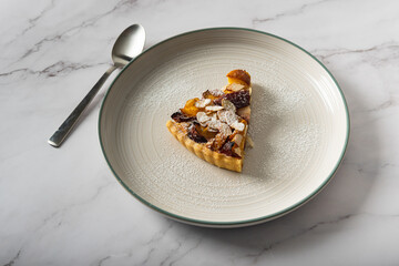 Homemade Peach tart with almond topping