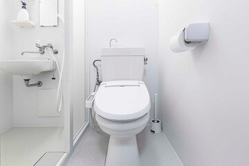 Modern automatic toilet In a small toilet in a wooden house