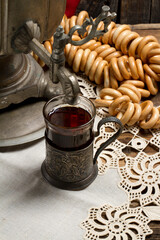 Naklejka na ściany i meble Russian traditional tea-drinking: a samovar, drying and tea in cup holder