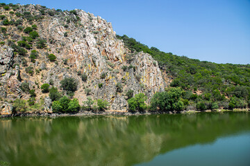 Fototapeta na wymiar Photo of the impressive and beautiful national park of Monfragüe, pure nature with rocks, lakes and no people. Outdoor environment located in Cáceres, Extremadura, Spain.