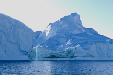 Blue iceberg in antarctic ocean, glacier landscape, melting ice, Antarctica