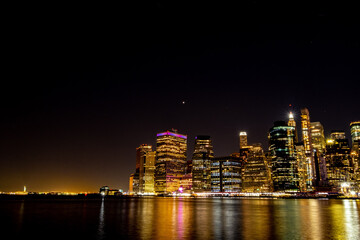 Fototapeta na wymiar Manhattan at Night from Brooklyn