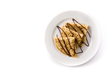 Sweet crepes with chocolate isolated on white background. Top view. Copy space