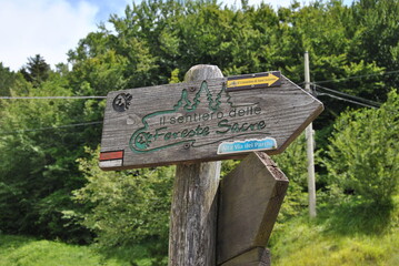 Signpost on the Muraglione Pass, a pass in the Tuscan-Emilian Apennines in the province of Florence, Tuscany, Italy, on the path of the Gothic Line and the path of the Sacred Forests.