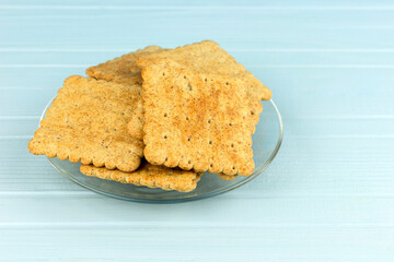 plate of cookies on a blue table