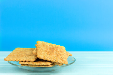 plate of cookies on a blue table