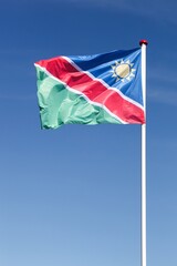 Flag of Namibia waving in the sky