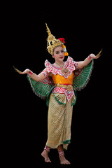 Fototapeta premium Beautiful Thai young woman portrait in Kinnaree traditional dress costume Art culture Thailand Dancing in masked khon Kinnaree in literature amayana, thailand culture Khon, Ayuttaya, Thailand .