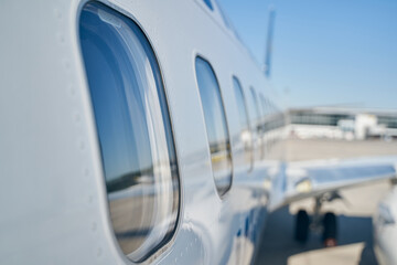 Glass windows on a passenger aircraft fuselage